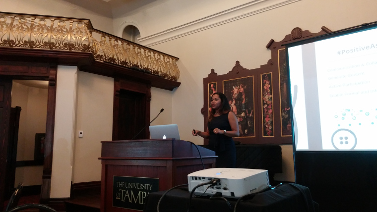 Dr. Romero-Hall presenting in the Music Hall.